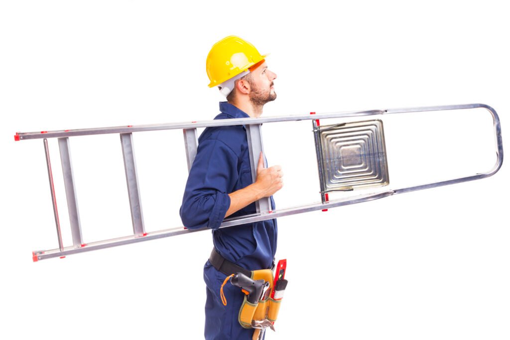 side view of a worker holding a aluminum stepladder, isolated on